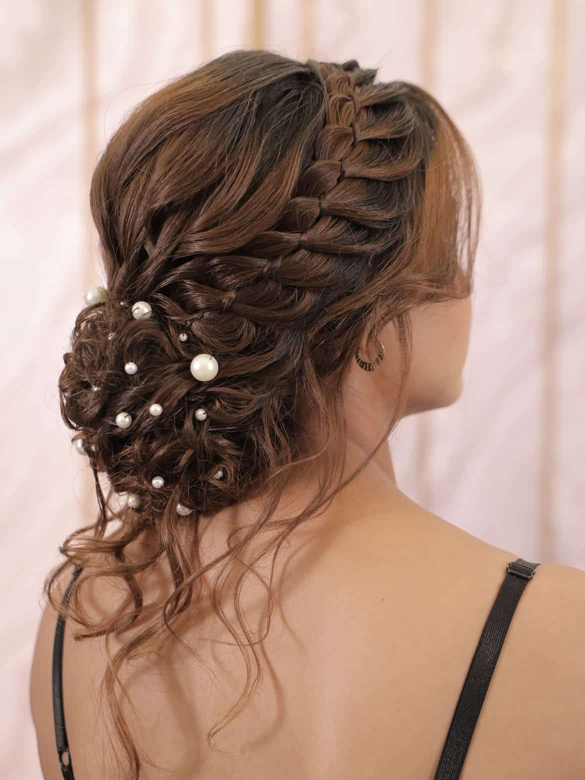 50. Braided Bun with Pearl Accents