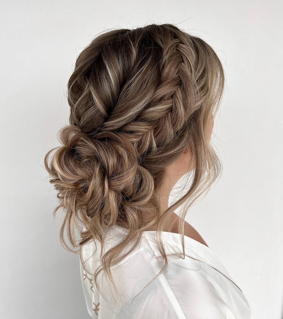 26. Braided Messy Bun Magic